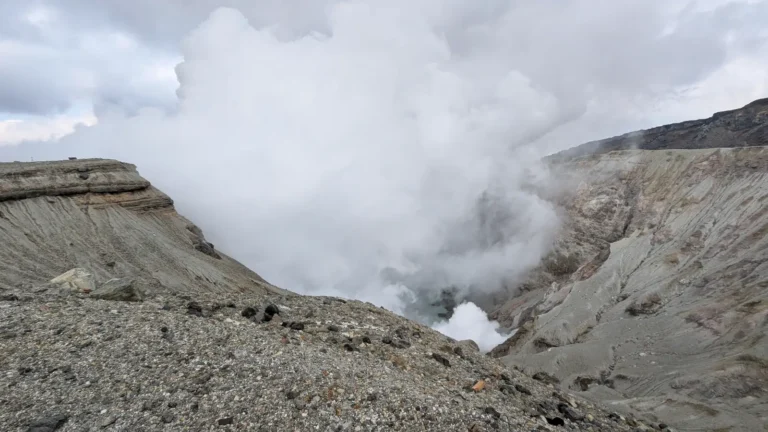 Volcanic steam rising from Mt. Aso’s crater in Aso-Kuju National Park, a dramatic nature escape in Kyushu, Japan.