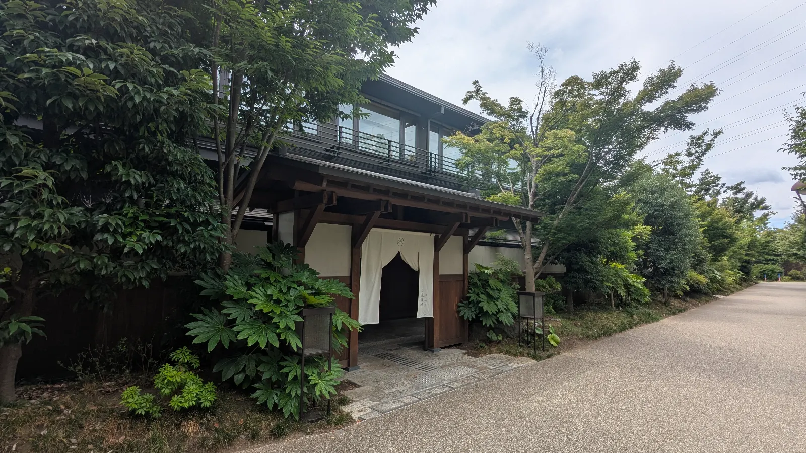 Inner garden and wooden architecture of Yuen Bettei Daita, a luxury modern ryokan in Tokyo’s Setagaya neighborhood